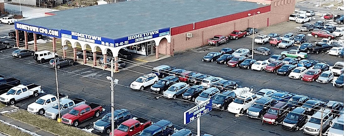 An aerial shot of the Hometown used car lot